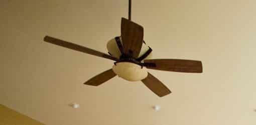 Ceiling fans keep you cool, but be sure to turn them off when you're not in the room.