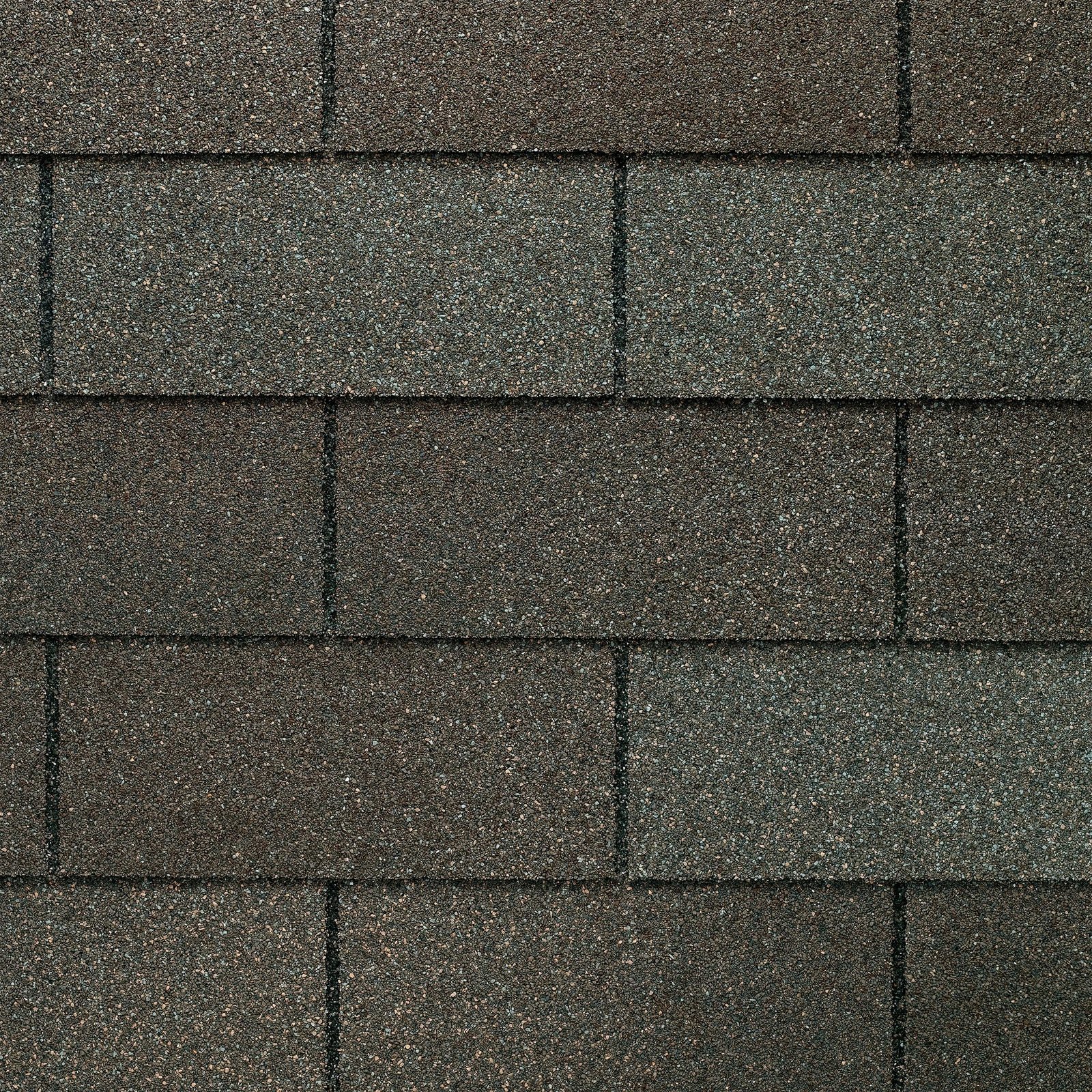 Close up photo of GAF's Royal Sovereign Weathered Gray shingle swatches