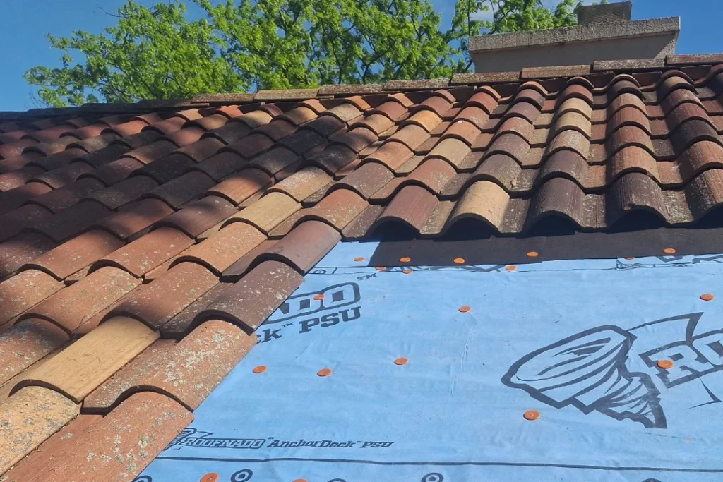 dirty spanish barrel roofing tiles